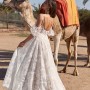 ABIGAIL-ML17809-FULL-LENGTH-LACE-GOWN-WITH-PLUNGING-NECKLINE-FITTED-BODICE-AND-FLOATY-SKIRT-LOW-BACK-AND-BUTTON-CLOSURE-WEDDING-DRESS-WITH-DETACHABLE-PUFFED-SLEEVES-MADI-LANE-BRIDAL2 ABIGAIL-ML17809-FULL-LENGTH-LACE-GOWN-WITH-PLUNGING-NECKLINE-FITTED-BODICE-AND-FLOATY-SKIRT-LOW-BACK-AND-BUTTON-CLOSURE-WEDDING-DRESS-WITH-DETACHABLE-PUFFED-SLEEVES-MADI-LANE-BRIDAL2